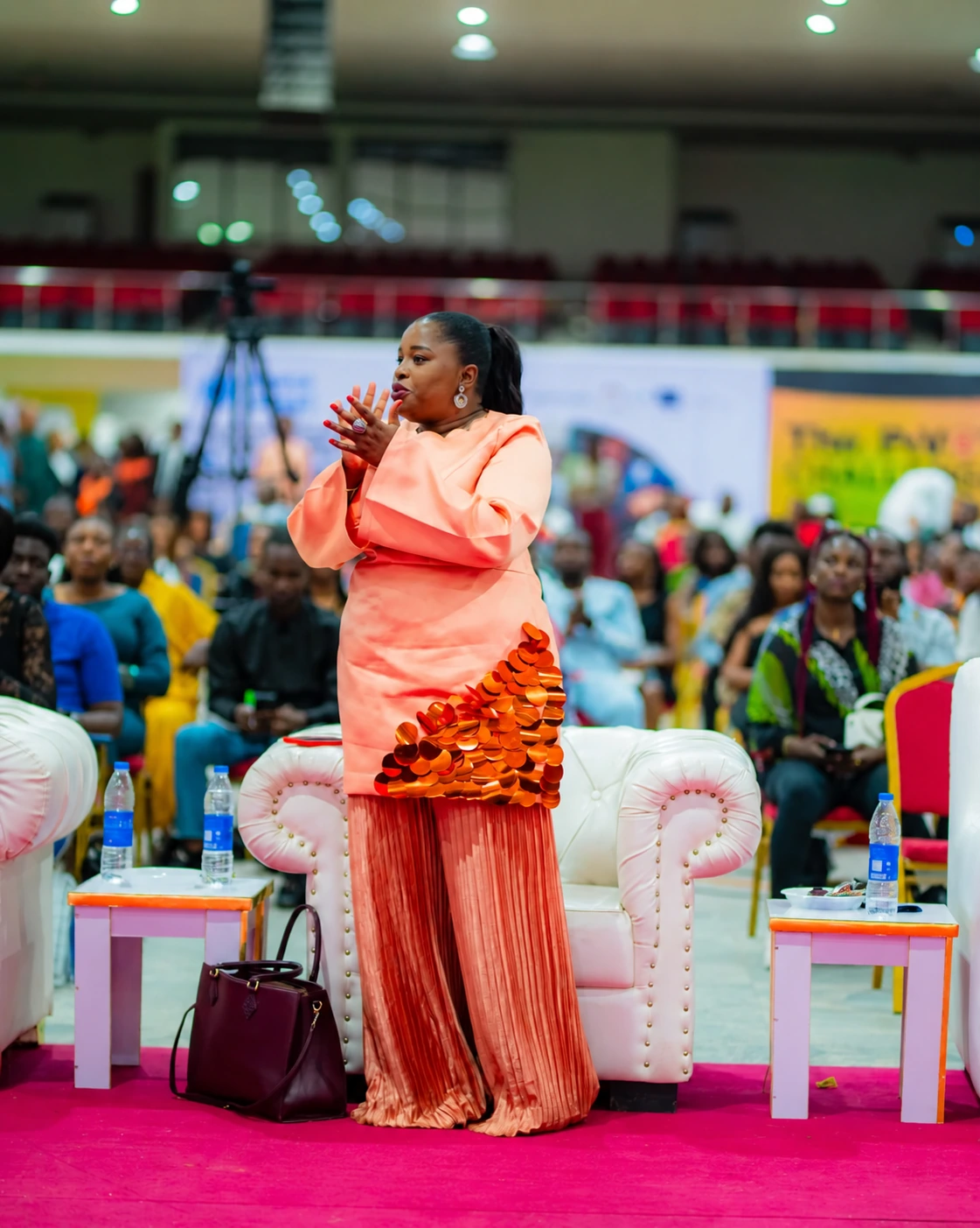 A delegate applauding at a previous Pivot conference
